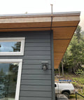 Wildfire Protection Sprinkler System With Bracket And Hardware, Includes 25 Ft Fire Resistant Hose installed on house eave