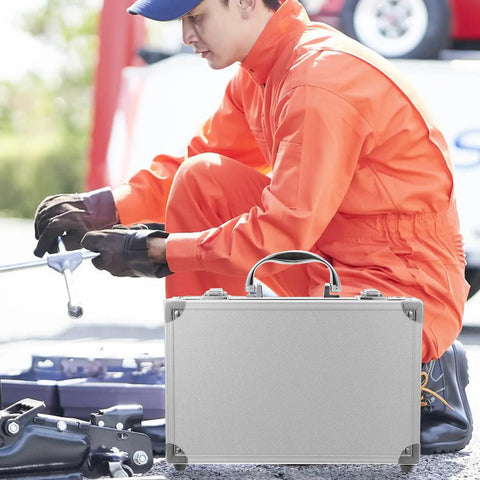 Rugged Aluminum Alloy Tool Case With Sturdy Carry Handle For Mechanics And Weekend Warriors near mechanic working on vehicle.