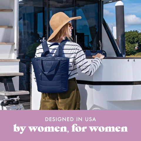 Woman on boat wearing Insulated Leakproof Cooler Backpack For Women Soft 12 Can Lunch Tote Lightweight Beach Picnic Bag Travel Ready Navy