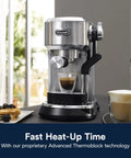 Top Shelf Compact Espresso Machine With Automatic Steam Wand Three Brew Temps Milk Foam Settings Dishwasher Safe Parts 15 Bar Pressure Stainless Steel Design That Hits Different on countertop with brewed espresso and pastries.