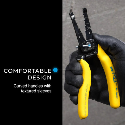Gloved hand holding Reflex Super NM Cable Stripper For 12/2 And 14/2 Solid NM Wire with yellow textured grip handles