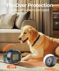 Portable 500W PTC Ceramic Space Heater For Indoor Use with tip-over protection, shown in a cozy living room next to a dog