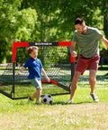 Father and son playing with 2 Pack 4 By 3 Foot Pop Up Soccer Goals For Backyard And Indoor Play Kids Youth And Adult Training Equipment Portable Nets