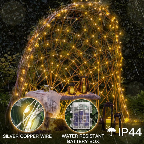 Outdoor tent illuminated by Grab These Super Cool Battery Operated Fairy Lights With Remote For Your Holiday Setup Featuring 33 Feet Of 100 LED Dimmable Twinkle String Lights Complete With Timer Waterproof Copper Wire Ideal For Bedroom Christmas Tree And Indoor Outdoor Decor In, showing IP44 rating.