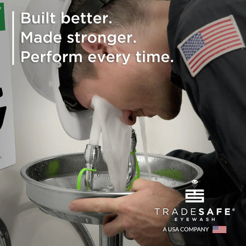 Person using Wall Mounted Eye Wash Station OSHA Approved Stainless Steel Eyewash Unit with corrosion-resistant finish.