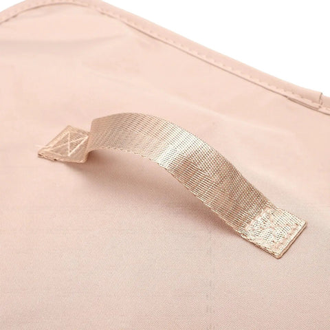 Close-up of heavy duty mesh travel dresser handle in smooth fabric, part of the large capacity hanging closet organizer.
