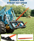 49 Inch Hay Spear With 3000 Lbs Capacity Orange Powder Coated Bale Fork attached to tractor in field