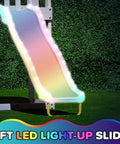 Cedar Wood Swing Set With Nighttime LED Swings And Slide, 6 Ft LED Slide glowing at night, backyard setting