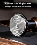Stainless steel rippled base of 58mm espresso tamper with ripple base and spring loaded precision pressure for even extraction.