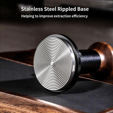 Stainless steel rippled base of 58mm espresso tamper with ripple base and spring loaded precision pressure for even extraction.