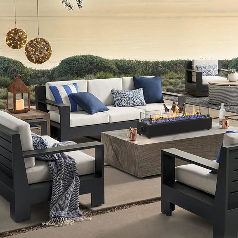 Outdoor patio scene with 28 Inch Tabletop Propane Fire Pit With 40,000 BTU, Portable Outdoor Rectangular Fire Bowl on wooden table