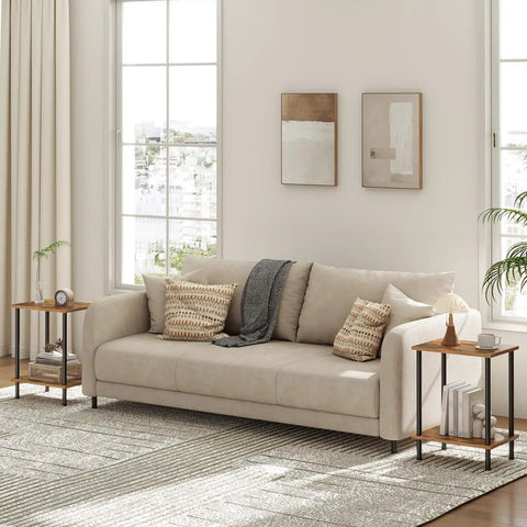 Set Of Two Rustic Brown End Tables Featuring Built Tough Industrial Frames Double Tier Storage in modern living room beside a sofa.