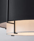 Close-up of 4 Light Dope Modern Black Fabric Chandelier For Dining Room Farmhouse Drum Style Pendant Light Fixture With Adjustable Down Rod E12 Bulbs Not Included 20 Inch Diameter 12 Inch Height LED Compatible, showing black fabric drum shade and metal detail.