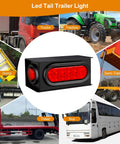 All In One Steel Trailer Light Box Kit With 6 Inch Oval Red 10 LED Tail Lights shown with various vehicles like trucks and buses