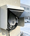 Top Shelf Weatherproof Wall Mount Ev Charger Cover With Reinforced Acrylic Door and Heavy Duty Uv Rain Shield, mounted, snowing.