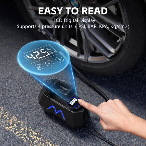 Portable Tire Inflator Air Compressor With Digital Pressure Gauge showing PSI, next to car tire on pavement