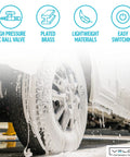 Car being washed with thick foam on wheels; Veloci logo bottom right