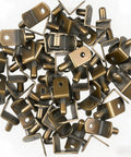 Rock Solid Steel Shelf Pins, Slick Bronze Plated 1/4 Inch Pegs, Heavy Duty Cabinet Retainers For Zero Hassle Storage In Kitchen Closets And Bookcases (40 Piece Set) in a close-up arrangement.