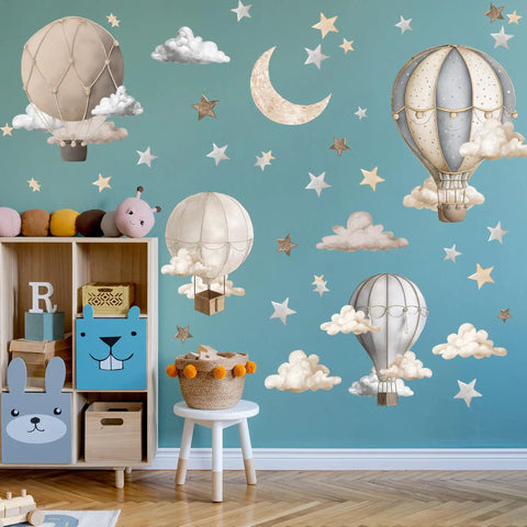 Dreamy Hot Air Balloon and Star Wall Decals Peel and Stick Vinyl Wall Stickers for Kiddo Sized Kids Room Nursery Decor on blue wall.