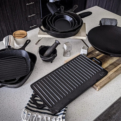 12 Inch Round Large Preseasoned Cast Iron Skillet Ready To Use Right Out Of The Box With Superior Heat Retention on countertop