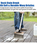 Person using a 7 Inch Deck Stain Brush Applicator For Wood Fence Brick And Concrete Surfaces Heavy Duty Outdoor Oil Staining Brush