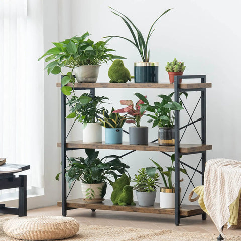 Heavy Duty Top Tier Industrial Bookshelf Featuring Solid Wood Planks And Sleek Matte Black Steel Frame For Living Room Decor zero hassle quick snap assembly with potted plants.