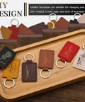 Top Shelf Pu Leather Keychain Blanks Set Contains Fifteen Heavy Duty Fob Tags In Six Bright Shades on a wooden tray.