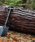 Adventure Mini Shovel 23 Inch Lightweight Aluminum Recovery Tool With Wrinkle Black Coating in outdoor forest setting