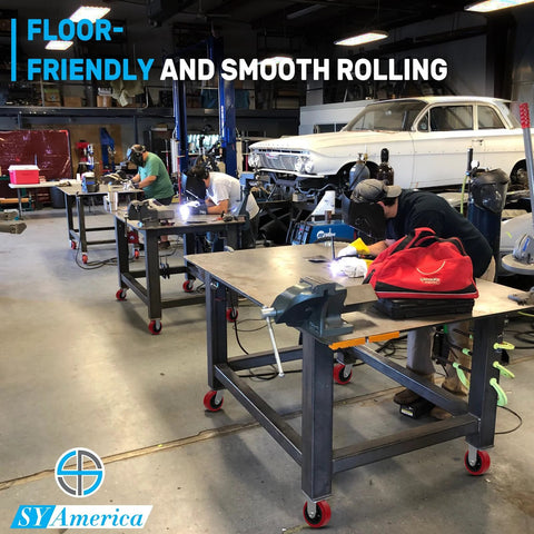 Industrial workbenches with 5 Inch By 2 Inch Heavy Duty Industrial Caster Wheels With Polyurethane On Polyolefin Core, Top Plate 4 Inch By 4.5 Inch, 2 Rigid And 2 Swivel With Top Lock Brake, 3200 Lbs Load Capacity Per Set in workshop setting.