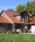 Heavy Duty Tough As Nails Clear Roof Sealer Stops Leaks Cold For Seven Years While Delivering Waterproof Armor For Metal Copper Concrete Roofs And Skylights In A Real Deal Five Gallon Size on a home with a metal roof.