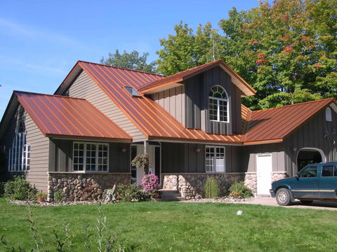 Heavy Duty Tough As Nails Clear Roof Sealer Stops Leaks Cold For Seven Years While Delivering Waterproof Armor For Metal Copper Concrete Roofs And Skylights In A Real Deal Five Gallon Size on a home with a metal roof.