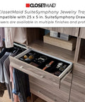 Open closet drawer showcasing jewelry tray inside SuiteSymphony unit, compatible with 25-inch drawers. Closet organization.
