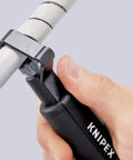 Close-up of a hand using Go To Dismantling Tool For Cable Sheaths 6 To 29 mm With Adjustable Cutting Depth Knurled Nut Flips