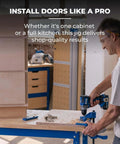 Man using a hand drill with a concealed hinge jig for 35mm cup holes, adjustable cabinet door installation tool with four-cutter carbide bit and stop collar on a workbench, Kreg.