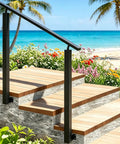 Adjustable Outdoor Stair Handrail Built Tough With Heavy Duty Galvanized Steel For Secure Porch And Deck Use Featuring Smooth Angle Alignment And No Sweat Side Mount Installation on wooden steps by the beach.