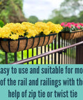 Four Pack Twenty Four Inch Black Metal Railing Planter Boxes With Natural Coco Fiber Liner And Heavy Duty Adjustable Clamps For Quick No Sweat Deck Fence Balcony Patio Garden with yellow flowers on a railing.