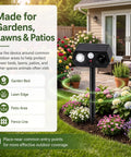 Solar Ultrasonic Critter Repeller With Motion Sensor And LED Flashing Light For Outdoor Yards And Gardens Deterring Deer Cats Dogs Rabbits Squirrels Raccoons And More Two Pack installed in flower bed
