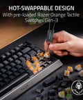 Slick Compact 75 Percent Mechanical Gaming Keyboard With Hot Swap Sockets showing orange tactile switches being replaced.