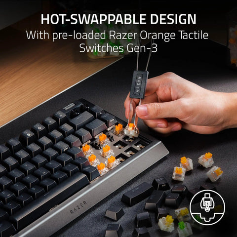 Slick Compact 75 Percent Mechanical Gaming Keyboard With Hot Swap Sockets showing orange tactile switches being replaced.