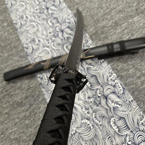 Close-up of Dope Six Color Iaido Training Katana Set With 1060 Carbon Steel Blades, black handle on patterned cloth