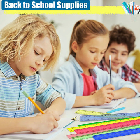 Children using 32 Pack 12 Inch Plastic Rulers Set With Transparent Colorful Dual Sided Measuring Tool Featuring Inches Centimeters