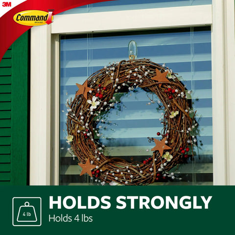 Clear Large Hook Set Of Four For Damage Free Hanging Includes Eight Large Strips Each Hook Holds Up To Four Pounds No Tools Required Easy Wall Door Cabinet And Closet Mounting With No Holes Marks Or Sticky Residue holding a wreath on a window