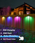 Solar Fence Lights 8 Pack IP65 Waterproof Outdoor RGB Color Lights With 10 Colors And 5 Modes illuminating garden fence.