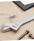 Stainless Steel B Type Cylindrical Flat Head Pins For Quick Alignment In Machinery, Furniture, And Electronics on a fabric surface with a wrench and bolts.