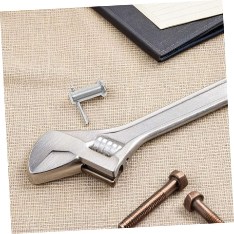 Stainless Steel B Type Cylindrical Flat Head Pins For Quick Alignment In Machinery, Furniture, And Electronics on a fabric surface with a wrench and bolts.