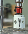 Close-up of a 13 Piece Hole Saw Set with Quick Change Arbor and Quickcore Technology for Up to 10X Faster Core Ejection in use