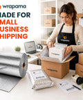 Woman packing box with Pro Grade Double Bubble Foil Insulation Roll With Heavy Duty Reflective Radiant Barrier For Straight Up Thermal Control And Hella Dependable Shipping Protection 12 Inch Wide 125 Feet Long.