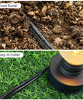 14/2 Low Voltage Landscape Lighting Wire For Outdoor Direct Burial 14 Gauge 2 Conductor 100 Feet Pure Copper Conductors For Superior Flexibility And Lower Resistance Built For Easy Yard Lighting Install visible partially buried in soil and laying on grass next to a light fixture.