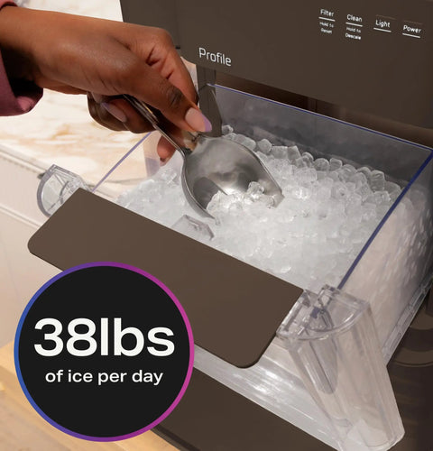 Countertop Nugget Ice Maker With 38 Lbs Daily Capacity And One Gallon Tank showing ice scoop in clear storage bin.
