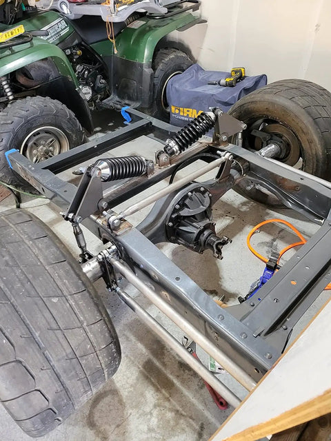 Vehicle chassis with suspension featuring 3/8 Inch Heim Joint Rod End Kit With Jam Nut And Bung Chromoly Panhard Kit for off-road use